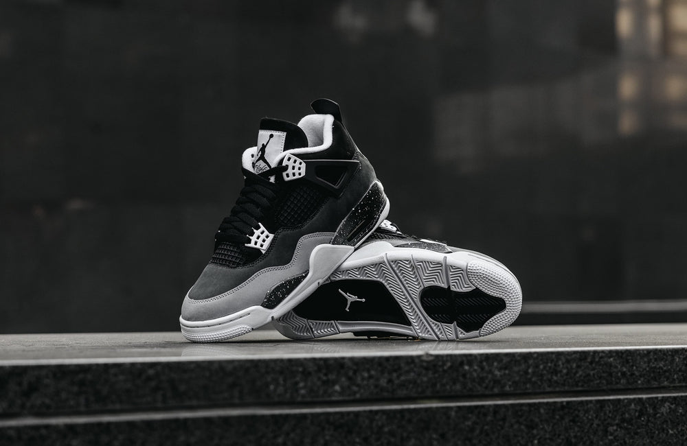 Black and white jordan 4 online